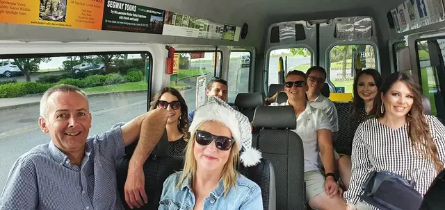 Guests settled into their seats aboard the tour bus