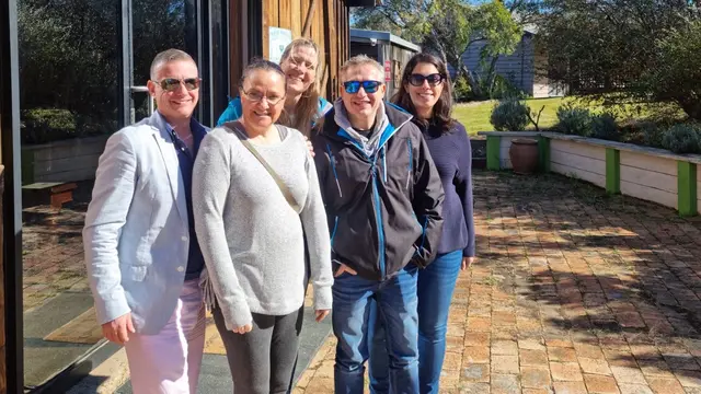 A group of five guests outside a Hunter Valley cellar door