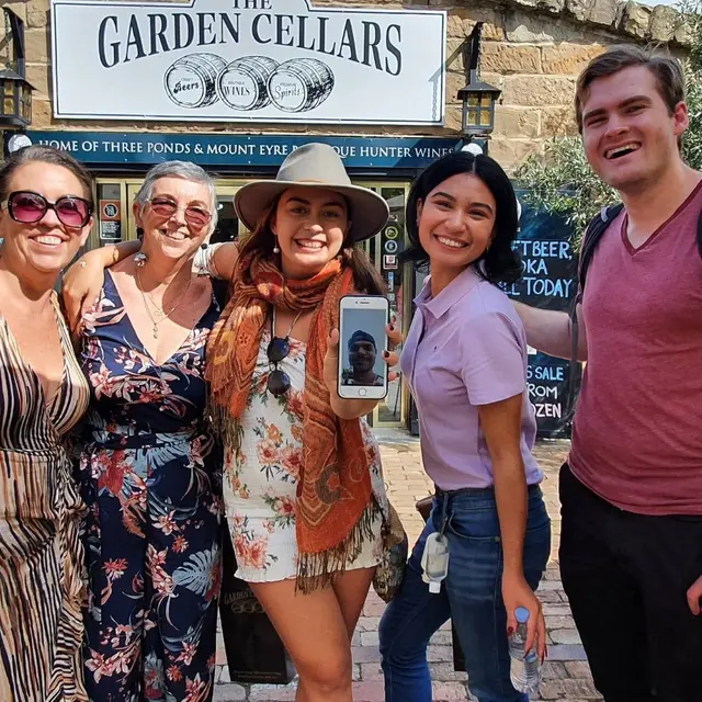 Guests outside The Garden Cellars on a summer afternoon