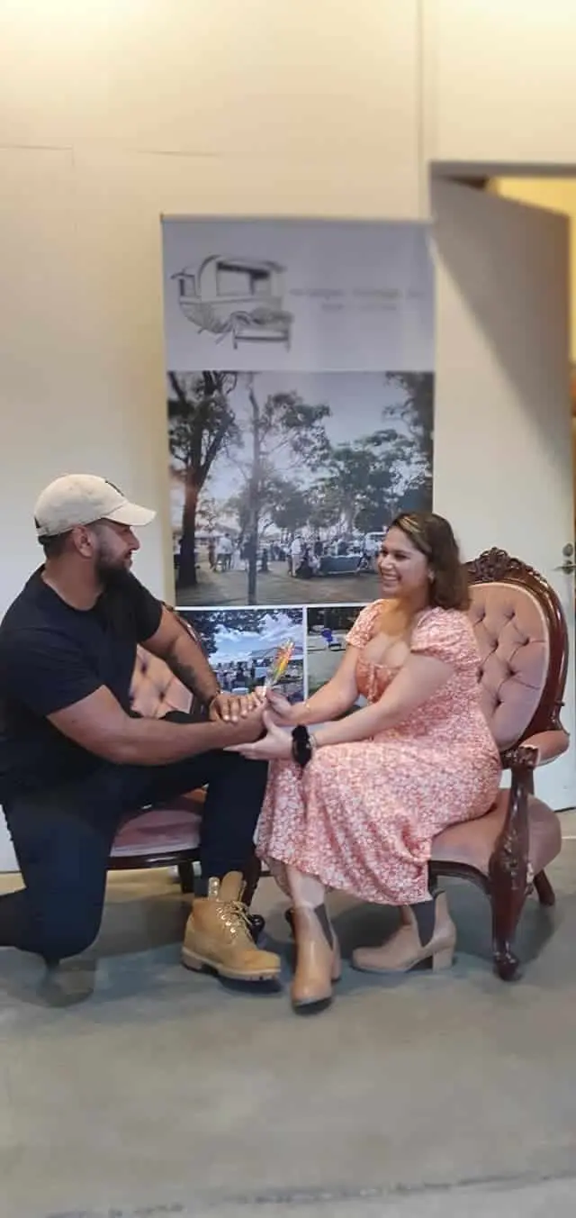 A proposal moment in a cellar door armchair